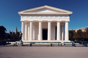 Theseustemple Vienna in Volksgarten with neoclassical Greek architecture and white marble columns.