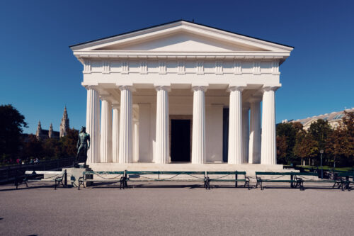Theseustemple Vienna in Volksgarten with neoclassical Greek architecture and white marble columns.