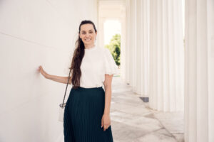 Adriana posing at the columns of Theseus Temple in Volksgarten.