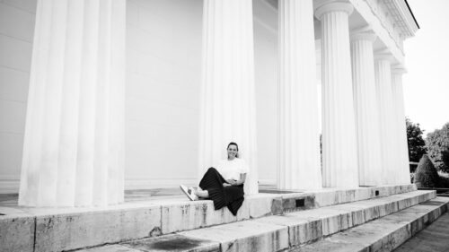 Adriana at Theseustemple Vienna with Doric columns and ancient Greek inspired architecture.