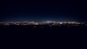 Twinkling city lights of Vienna from Cobenzl, creating a magical nighttime panorama.