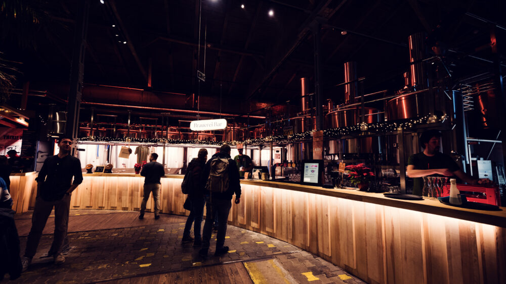 Intimate bar area featuring restored industrial elements.