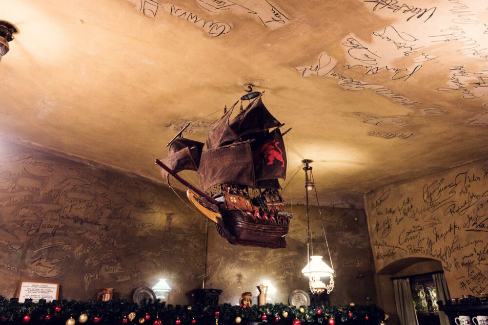 Mark Twain Room at Griechenbeisl, adorned with signatures of famous guests throughout history.