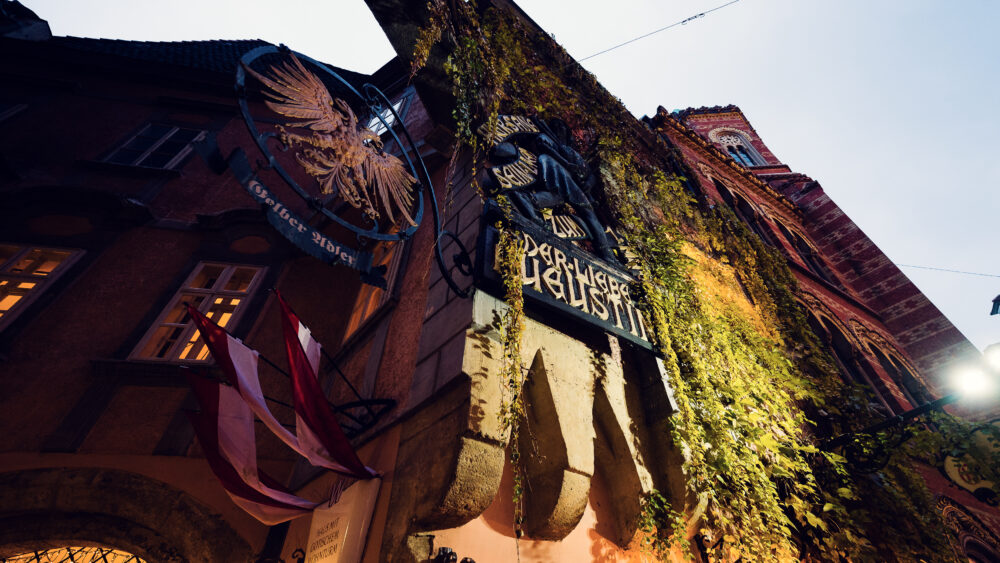 Traditional exterior of Griechenbeisl, with its iconic signage and medieval architecture.