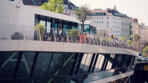 Motto am Fluss, its white exterior creating perfect contrast with the Danube Canal.