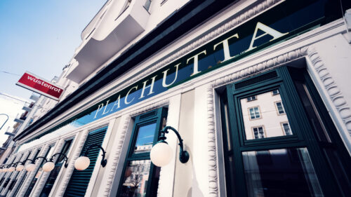 Historic facade details with preserved 19th-century elements at Plachutta Wollzeile.