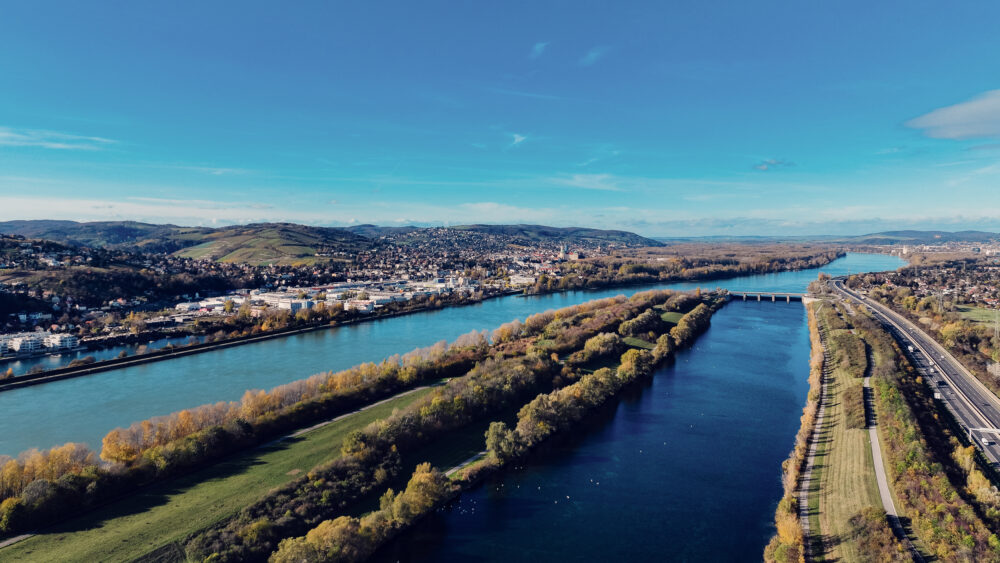 Donauinsel Vienna nature reserve sections with protected flora and fauna along riverbank ecosystem.