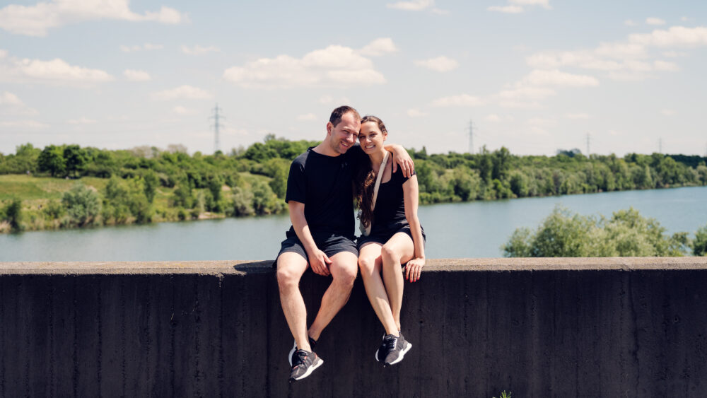 Adriana and Mario resting after cycling on Vienna Danube Island.