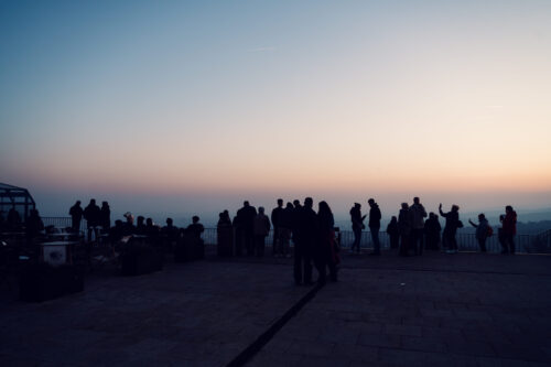 Kahlenberg viewing platform at sunset with dramatic cityscapes across Vienna's districts.
