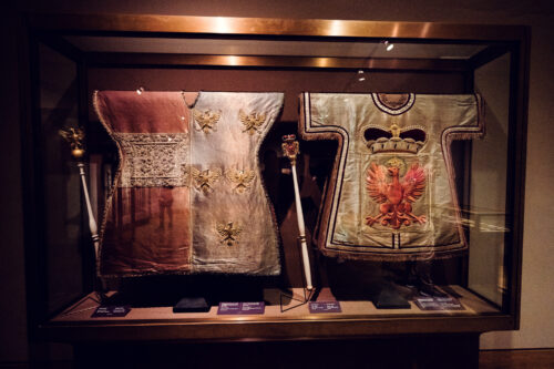 Resplendent Herald's Tabard at Vienna's Imperial Treasury, a symbol of official proclamation and royal messaging in the Kingdom.
