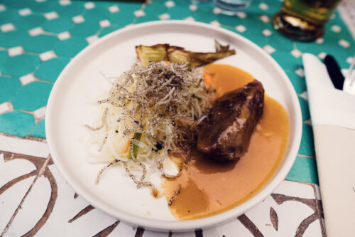 Contemporary food preparation style at Lucullus Vienna featuring refined cooking methods.