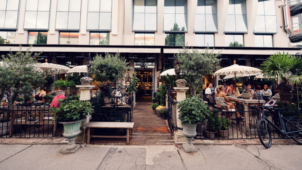 Lucullus Terrace Vienna during daytime with outdoor dining area and natural daylight on restaurant terrace.