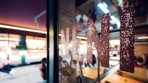 Close-up of the NENI logo entrance door.