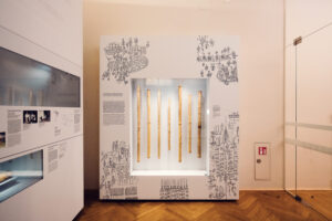 Engraved bamboo tubes at Weltmuseum Wien.