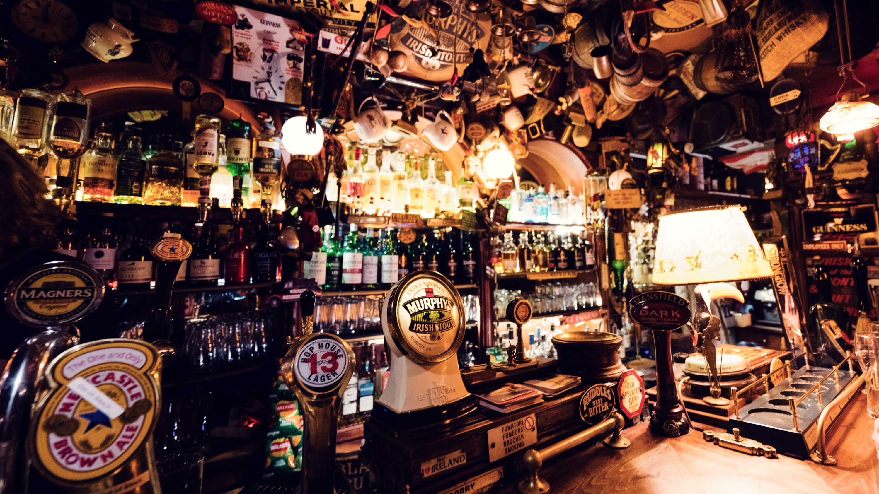 Traditional pub seating areas at Bockshorn featuring dark wood elements.