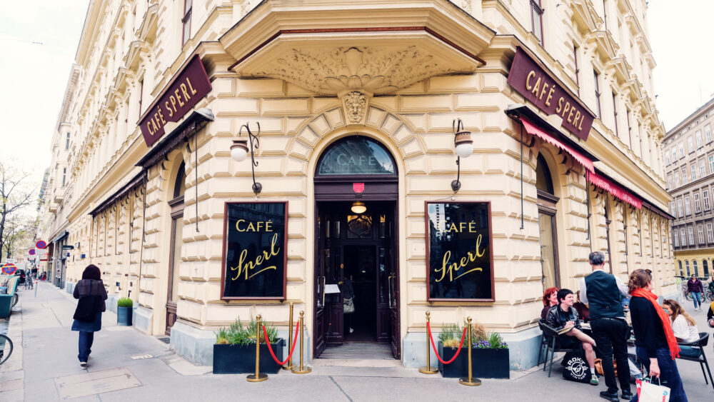 Historic facade of Café Sperl featuring classic Viennese architecture and traditional signage.