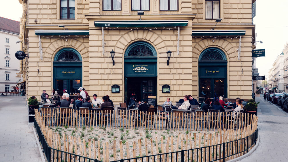 Terrace at Flanagan's Irish Pub, where traditional pub furniture creates perfect outdoor atmosphere in Vienna's historic center.
