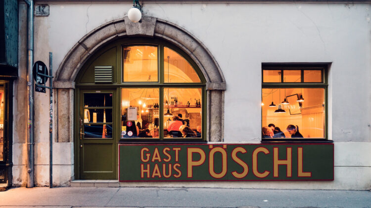 Historic entrance of Gasthaus Pöschl in Vienna.