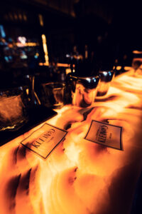 Evening atmosphere in Kleinod Bar with dimmed lighting.