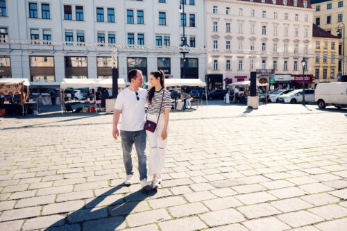 Adriana and Mario exploring Am Hof (Am Hof Square) Vienna during sunny weather.