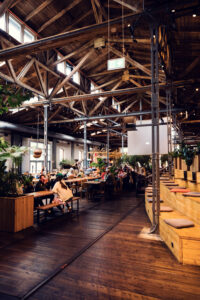 Interior of Gleis//Garten Vienna inside the former railway carriage shed.