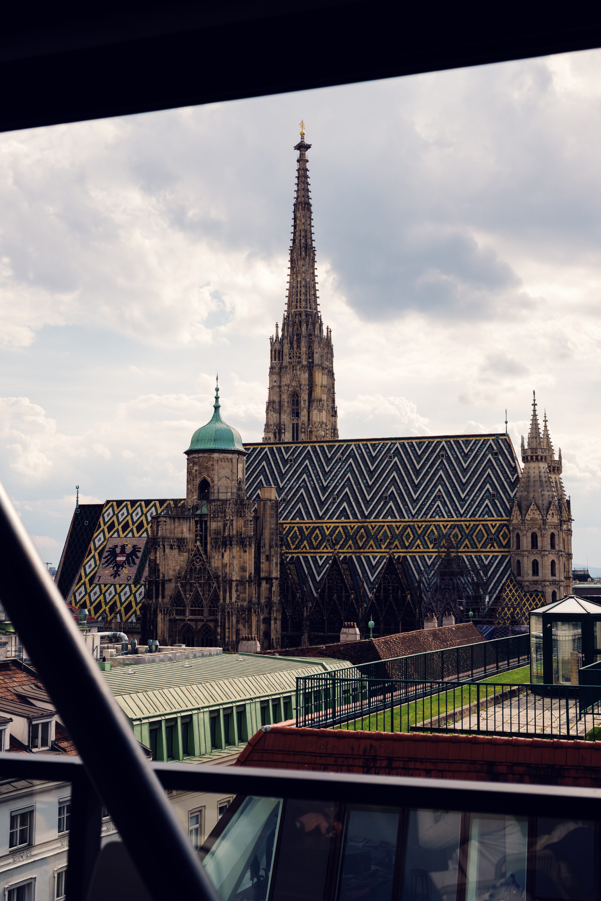 St. Stephen's Cathedral and its patterned tile roof seen from the Lamée Rooftop terrace.
