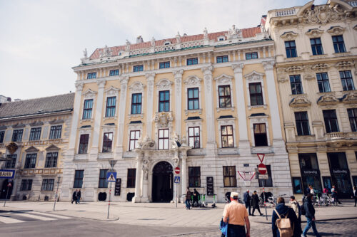 Palais Kinsky Wien (Kinsky Palace Vienna) baroque facade with ornate stucco decorations and classical Austrian palace architecture on Freyung square.