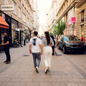 Adriana and Mario walking through Vienna First District Innere Stadt historic city center streets.