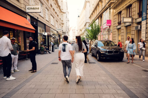 Adriana and Mario walking through Vienna First District Innere Stadt historic city center streets.