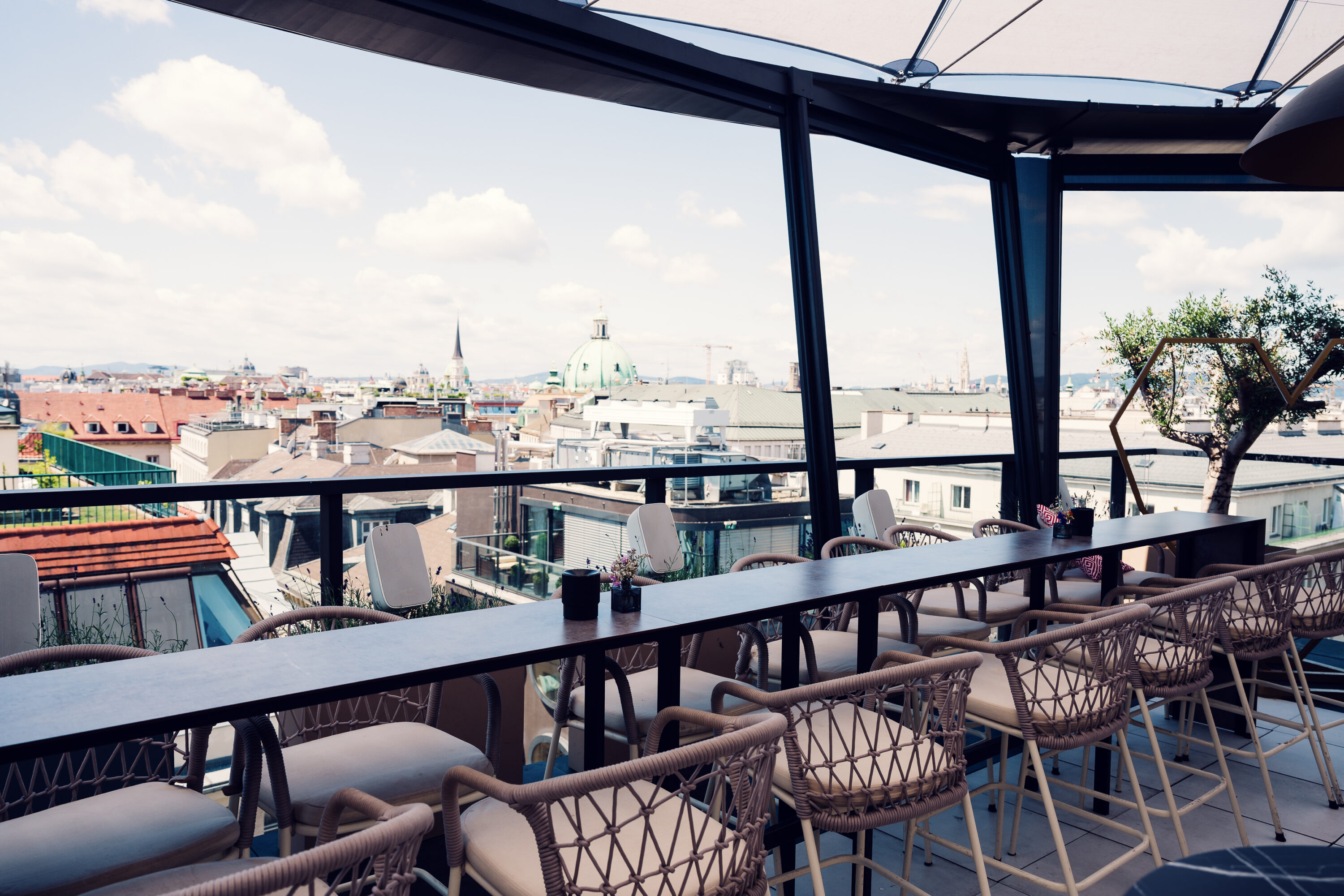 Panoramic city view from Lamee Rooftop Bar in Vienna.