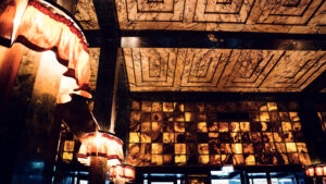 Loos Bar Vienna interior with Art Deco design and dark wood paneling.