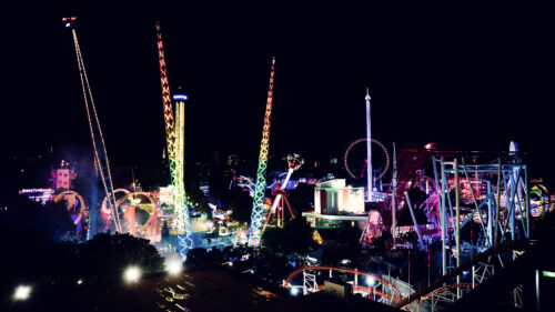 View from Neni am Prater terrace showing Prater recreational area and Vienna skyline.