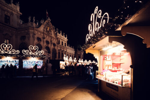 Christmas village market stalls in front of Baroque Belvedere Palace (Schloss Belvedere).