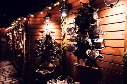 Wooden toy and gift stand at Freyung Altwiener Christkindlmarkt Vienna.