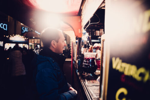 Traditional Austrian food stall at Wintermarkt Prater serving seasonal dishes.