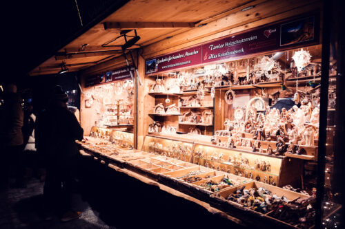 Traditional wooden market stalls at Schönbrunn Christmas Market.