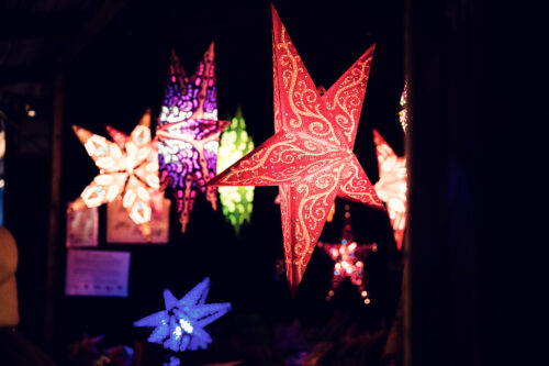 Evening view of illuminated Spittelberg Christmas Market.