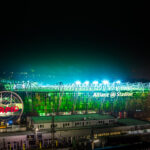 The Allianz Stadion in Vienna lit up in green at night, home of SK Rapid Wien